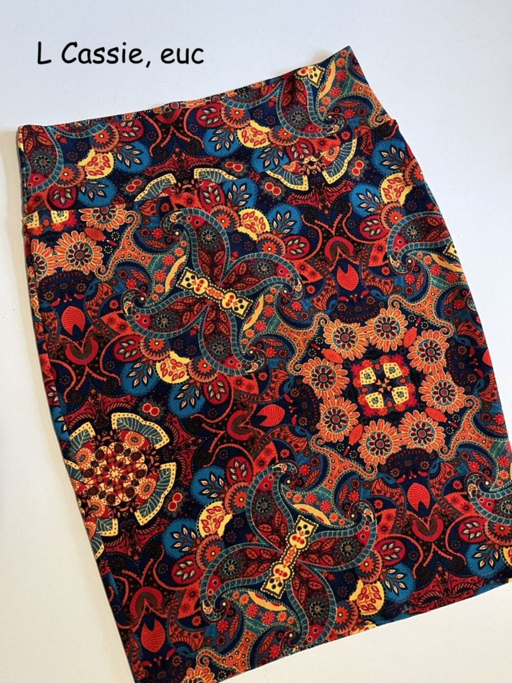 Large Lularoe Cassie pencil skirt, navy with blue, red, orange, yellow circles